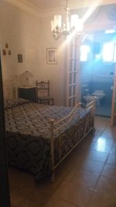 Tempat tidur dalam kamar di B&B la Conca Stella