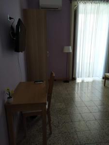 Televízia a/alebo spoločenská miestnosť v ubytovaní B&B A Casa Di GioSi