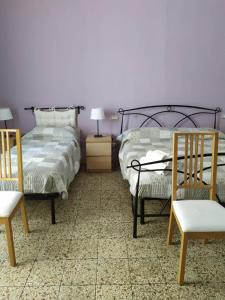 Posteľ alebo postele v izbe v ubytovaní B&B A Casa Di GioSi