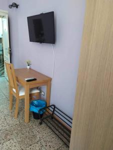 Televízia a/alebo spoločenská miestnosť v ubytovaní B&B A Casa Di GioSi