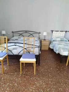 Posteľ alebo postele v izbe v ubytovaní B&B A Casa Di GioSi