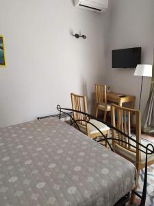 Posteľ alebo postele v izbe v ubytovaní B&B A Casa Di GioSi