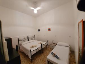 Postel nebo postele na pokoji v ubytování Casa Francy a 5min da Marzamemi