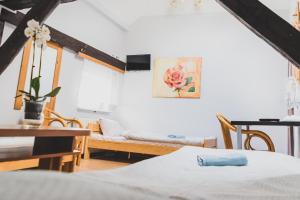 Postel nebo postele na pokoji v ubytování Zajazd Pod Lipami