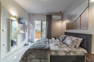 A bed or beds in a room at Modern Flat