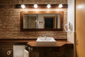 A bathroom at Wello Apartments