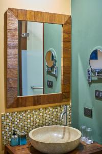 a bathroom with a sink and a mirror at Avatar Railay in Railay Beach
