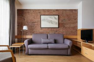 A television and/or entertainment centre at Wello Apartments