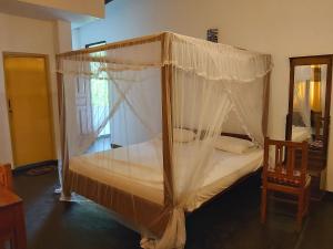 Letto o letti in una camera di Sunstyle Mirissa Guest House