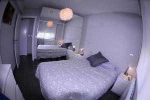 Postel nebo postele na pokoji v ubytování APARTAMENTOS URDAIBAI 4