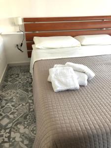 Postel nebo postele na pokoji v ubytování B&B da Mary