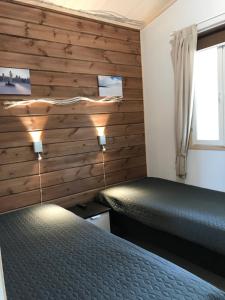 Llit o llits en una habitació de Villa Haukka