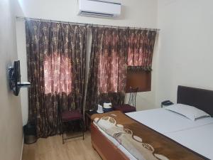 Postel nebo postele na pokoji v ubytování Hotel Sweet Dream