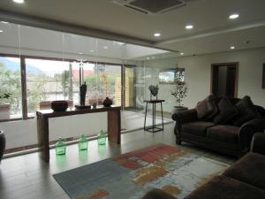 The lobby or reception area at Hotel Pucón Indómito