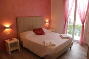 Postel nebo postele na pokoji v ubytování B&B Selene