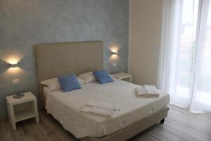 Postel nebo postele na pokoji v ubytování B&B Selene