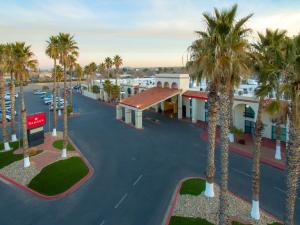 an overhead view of a parking lot with palm trees at Ramada by Wyndham Las Cruces Hotel & Conference Center in Las Cruces