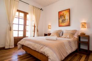 Säng eller sängar i ett rum på Maison entière ChezSoa, antananarivo