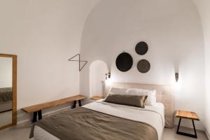 Postel nebo postele na pokoji v ubytování Echo Caves Suites + 31 fotografií