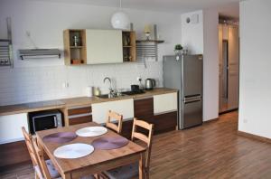 Kuchyňa alebo kuchynka v ubytovaní Apartament Spacerowa
