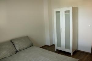 Posteľ alebo postele v izbe v ubytovaní Apartament Spacerowa
