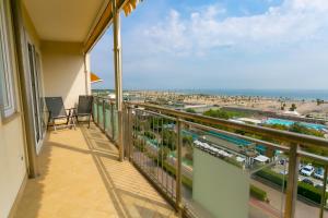 A balcony or terrace at Le Murrine Frontemare Apartment Seaview