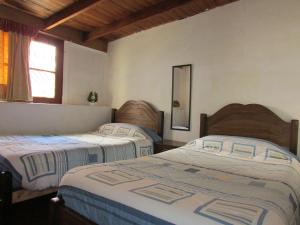 Krevet ili kreveti u jedinici u okviru objekta Hostería Baños Morales