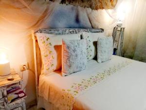 Llit o llits en una habitació de Casinha do Sol-Posto