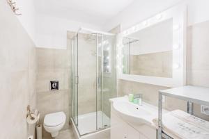 Ένα μπάνιο στο Hamak Apartamenty +61 φωτογραφίες
