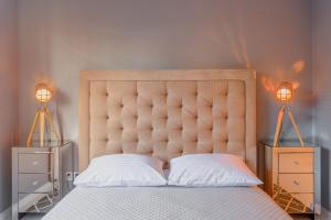 
Łóżko lub łóżka w pokoju w obiekcie Hamak Apartamenty
