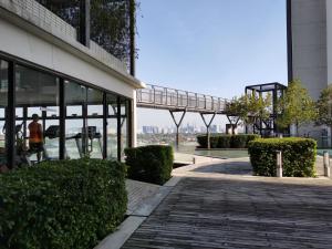 a building with a walkway in front of a building at Urban360 Studio & Trio by La Ritz in Batu Caves