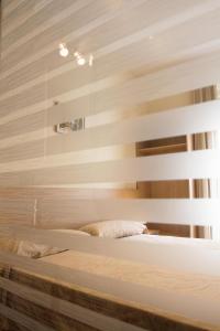 a bedroom with two beds and a window at Hostal Excellence in Barcelona