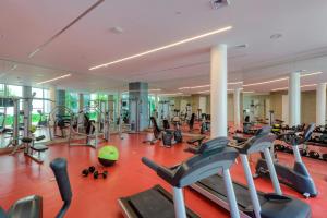 a gym with a lot of treadmills and exercise bikes at Aqua Boracay in Boracay