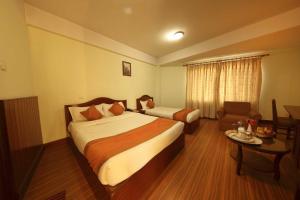 Ένα ή περισσότερα κρεβάτια σε δωμάτιο στο Samsara Boutique Hotel