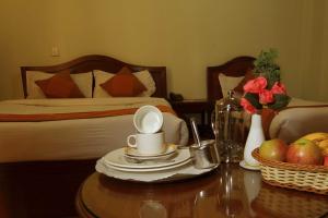 Ένα ή περισσότερα κρεβάτια σε δωμάτιο στο Samsara Boutique Hotel