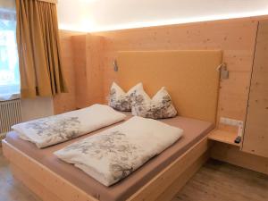 Ліжко або ліжка в номері Haus Leo