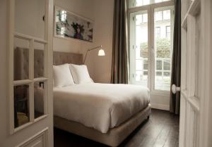 Cama ou camas em um quarto em Hotel B