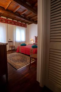 A bed or beds in a room at Il Rifugio