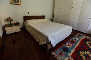A bed or beds in a room at Il Rifugio