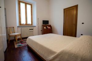 A bed or beds in a room at Il Rifugio