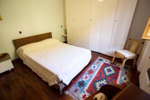 A bed or beds in a room at Il Rifugio