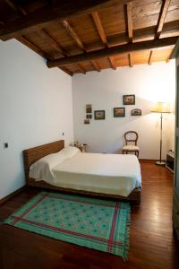 A bed or beds in a room at Il Rifugio