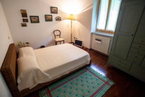 A bed or beds in a room at Il Rifugio