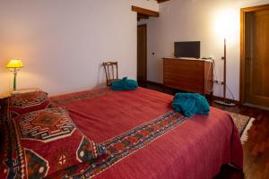 A bed or beds in a room at Il Rifugio
