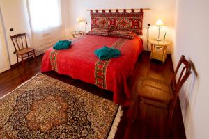 A bed or beds in a room at Il Rifugio