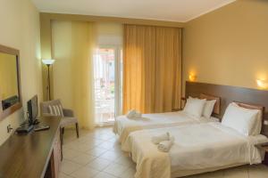 Posteľ alebo postele v izbe v ubytovaní Samothraki Village Hotel + 37 fotografií