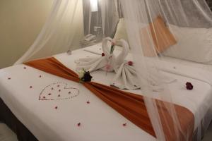 Postel nebo postele na pokoji v ubytování Greenotel Cilegon + 31 fotografií