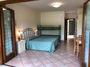 Ένα ή περισσότερα κρεβάτια σε δωμάτιο στο Casa Vacanze Patrizia