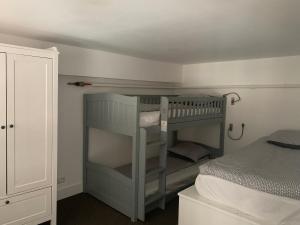 En eller flere senge i et værelse på Le Mont Joly