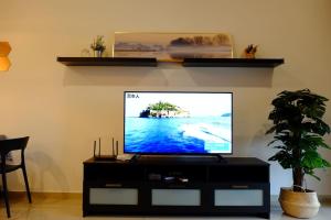 Телевизор и/или развлекательный центр в Atlantis Residence by Harmoni Harbour